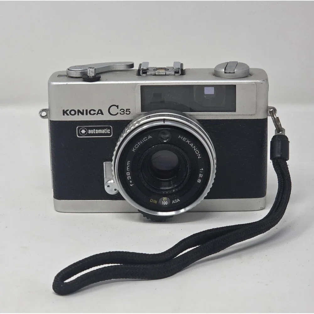 Konica C35 Automatic 35mm Film Camera Hexanon 38mm f/2.8 Shutter Fires Japan
